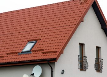 roof-of-a-new-house-made-from-yellow-roofing-tiles-2022-01-11-03-01-52-RZ7XCF8-1-1-1024x683.jpg